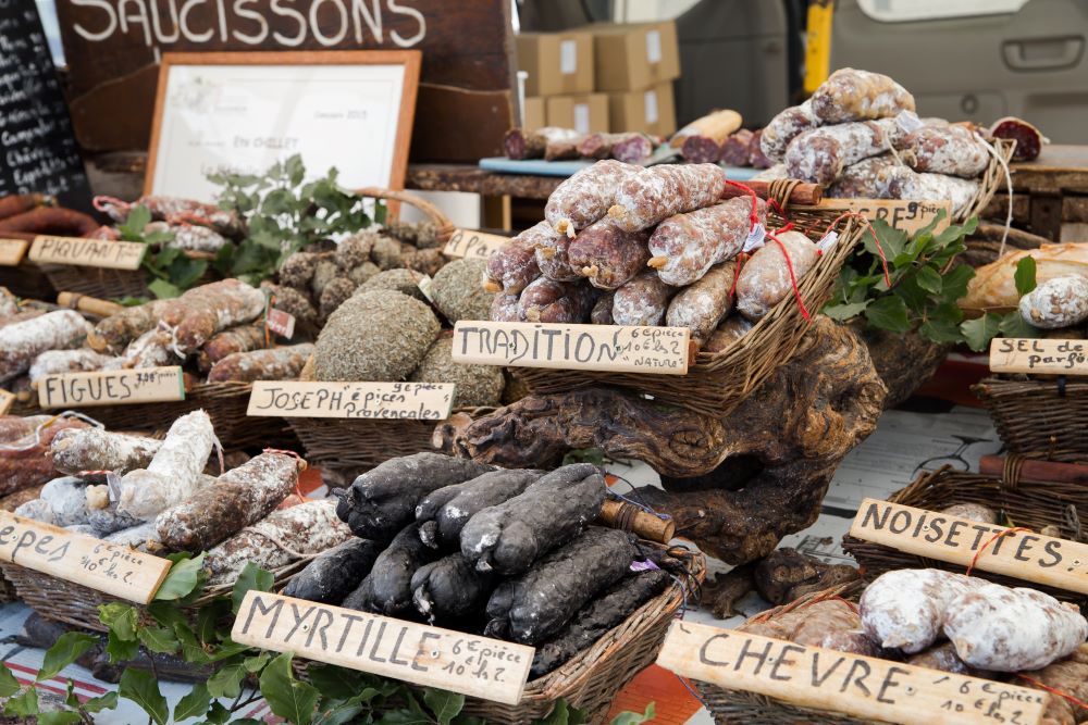 A selection of meat at a market stall